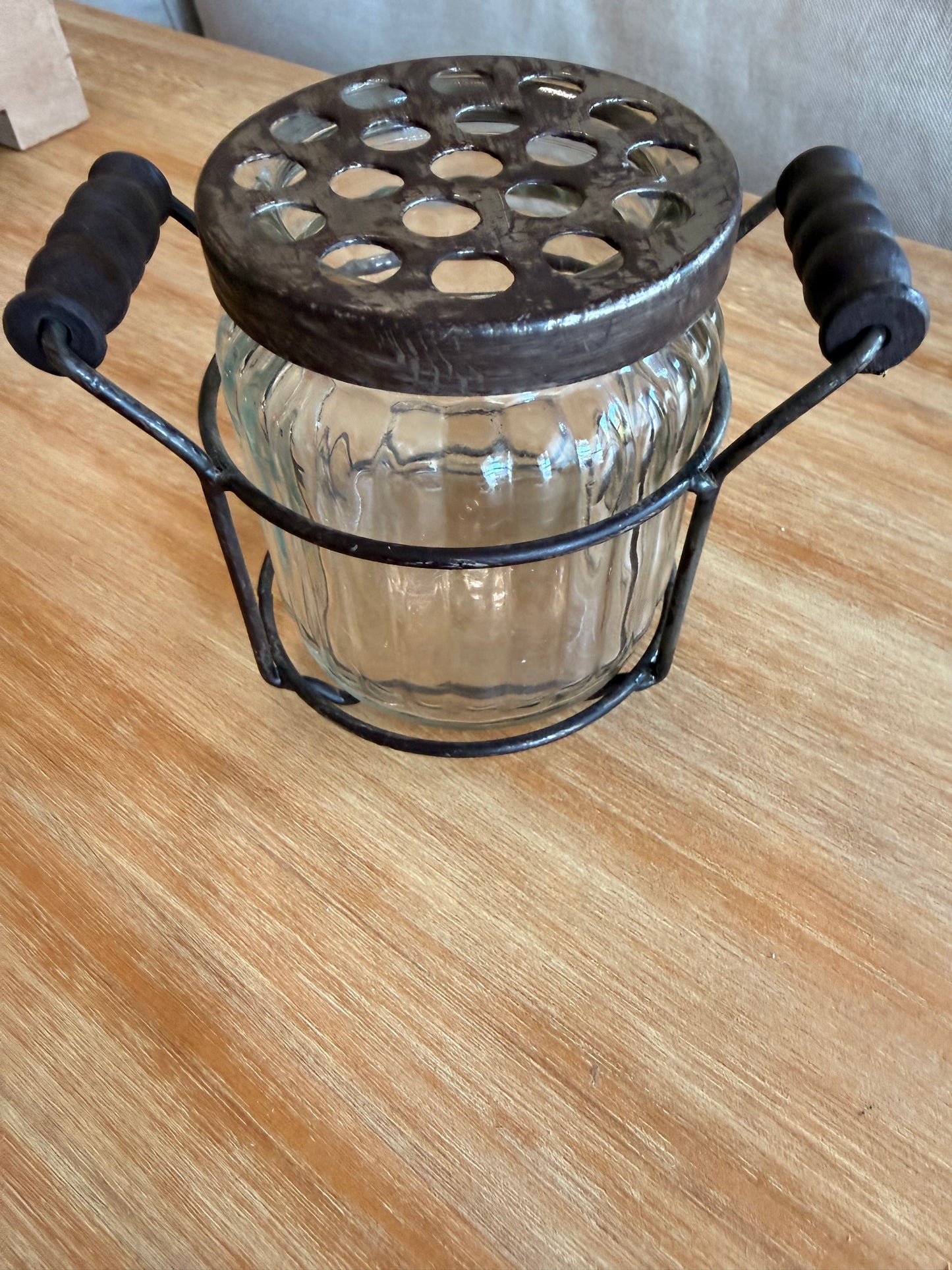 Glass flower jar in holder