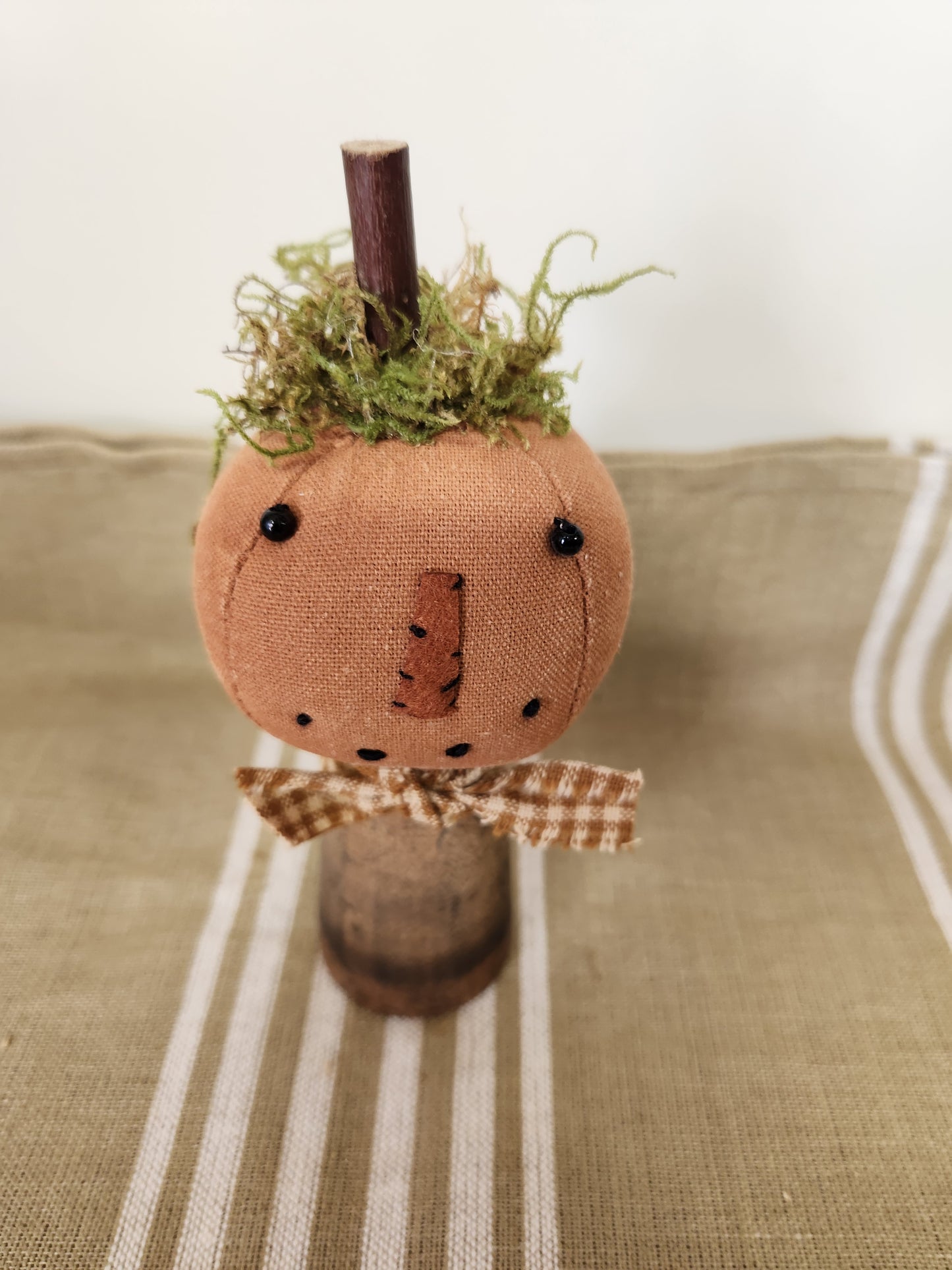 Pumpkin on wood bobbin