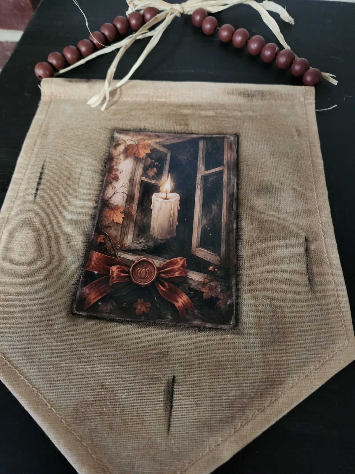 Cloth banner with candle print