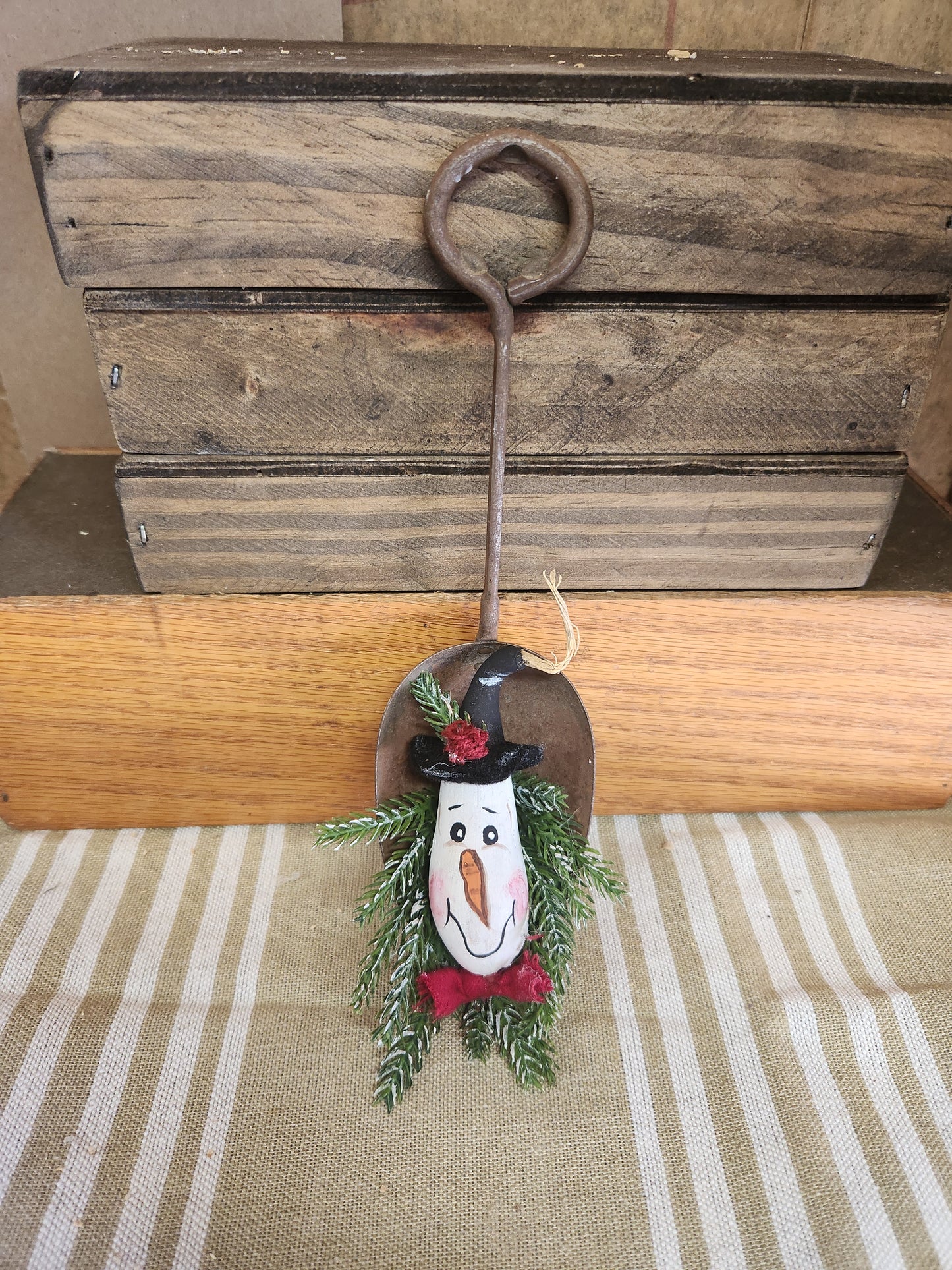Snowman gourd in vintage spoon