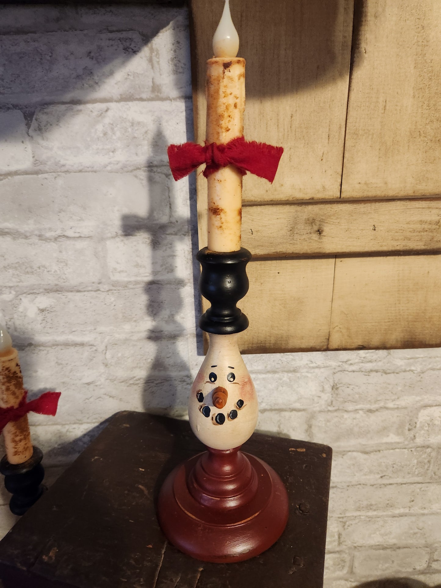 Candle stick snowman with timed candle