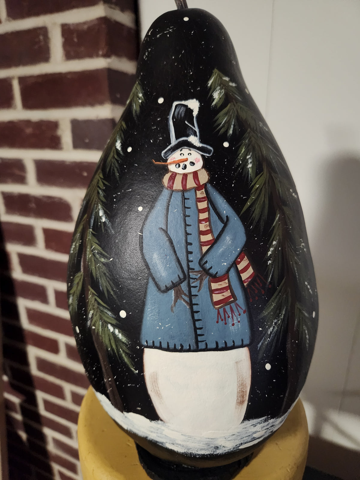 Snowman with blue coat gourd
