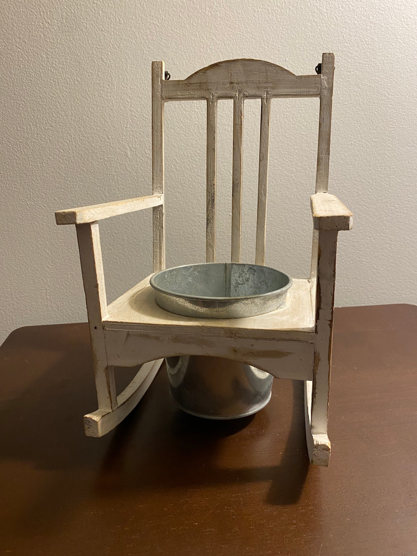 Hanging rocking chair plant holder