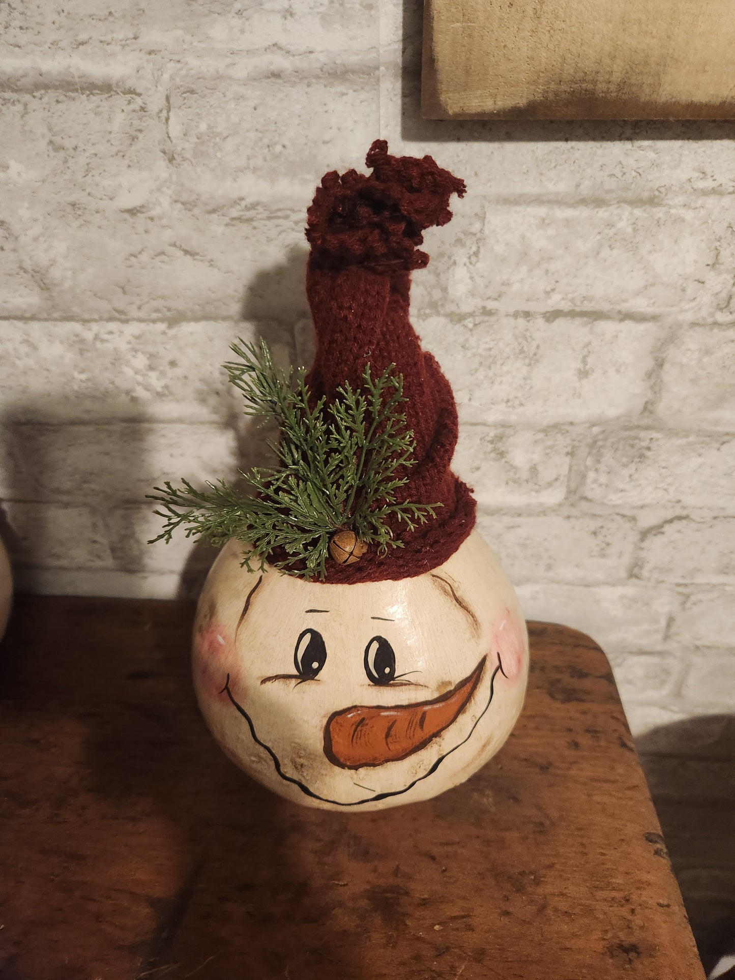 Snowman gourd with red hat