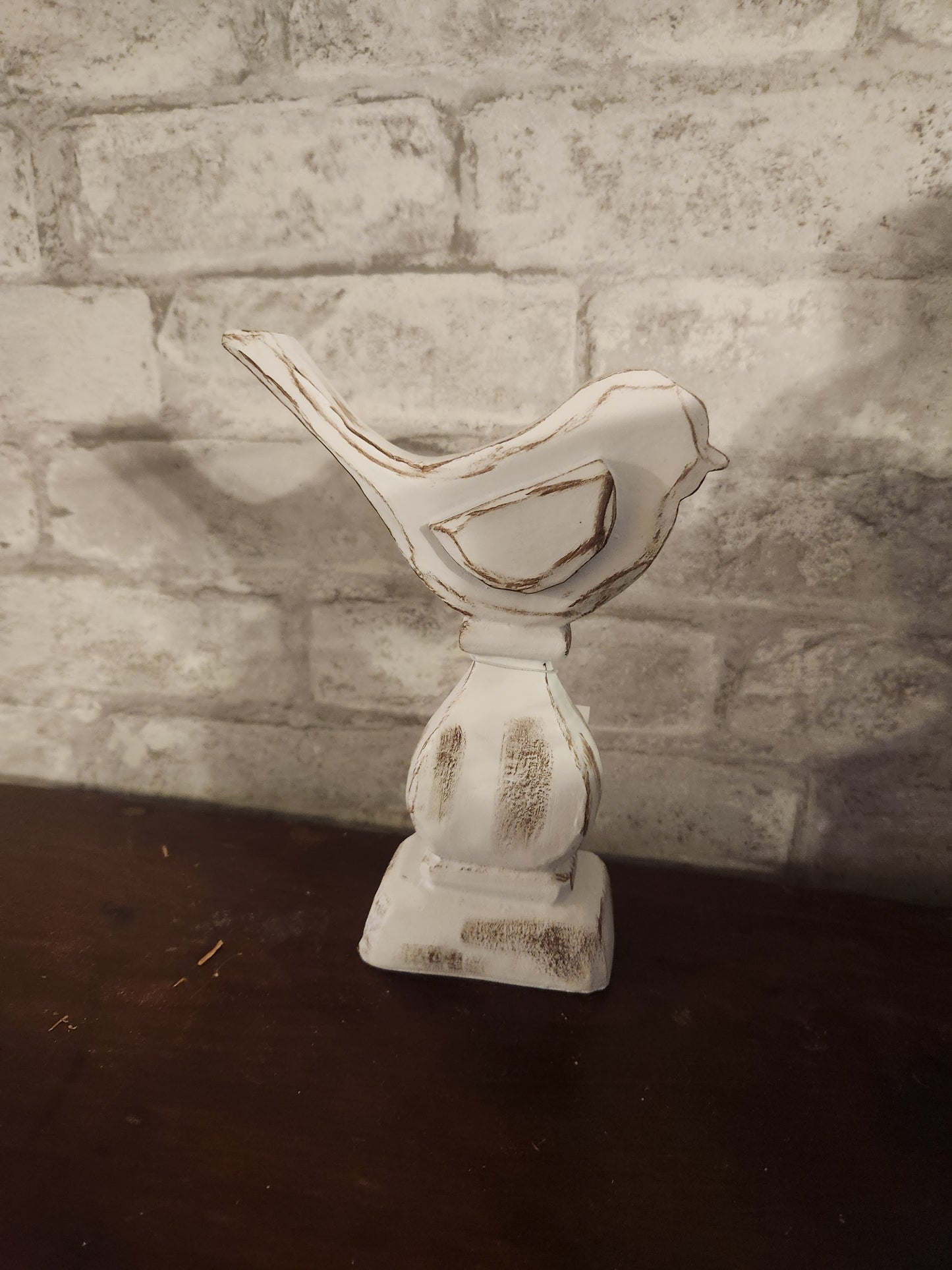 White bird on finial