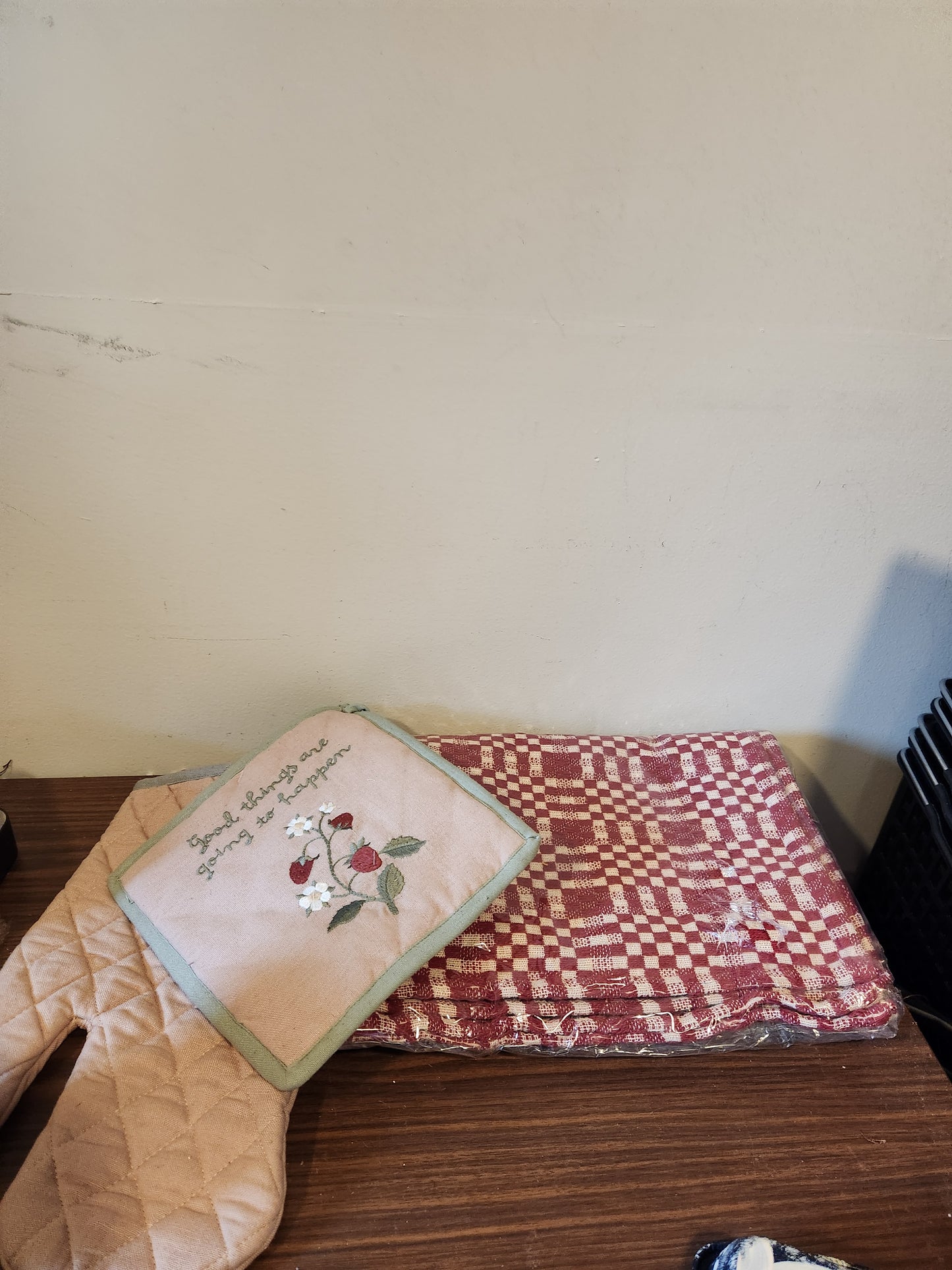 Placemats and strawberry potholder