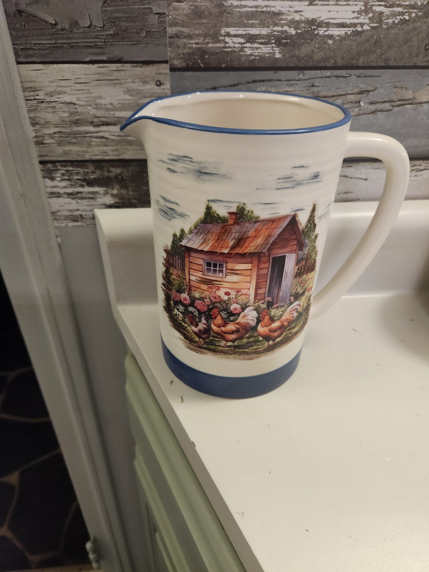 Pitcher with blue accents