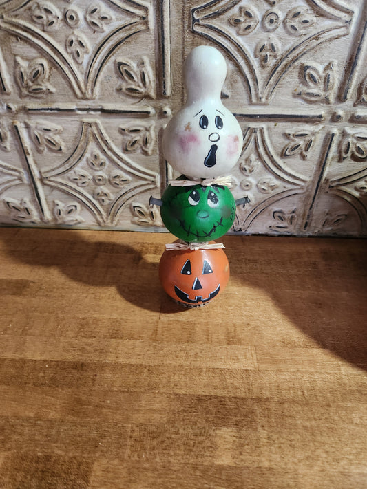 Ghost Frankenstein and jack-o-lantern gourd stack