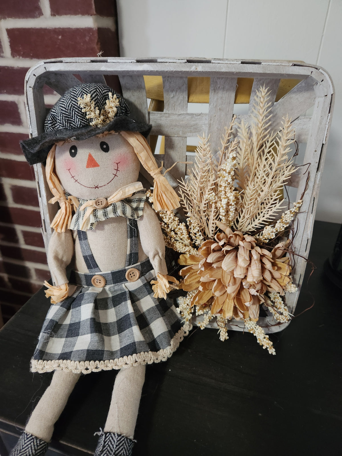 Scarecrow on tobacco basket