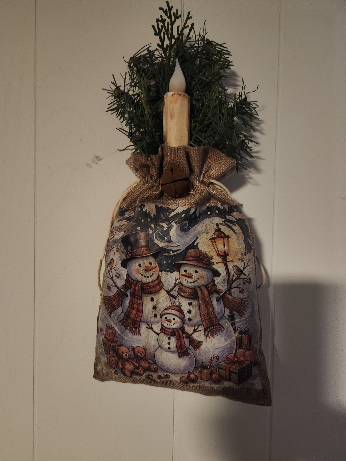 Vintage snowman bag with timed candle