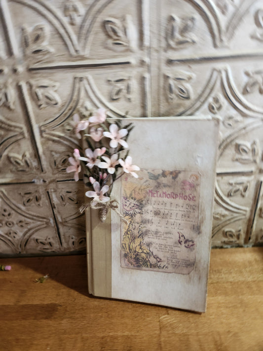 Book with pink flowers