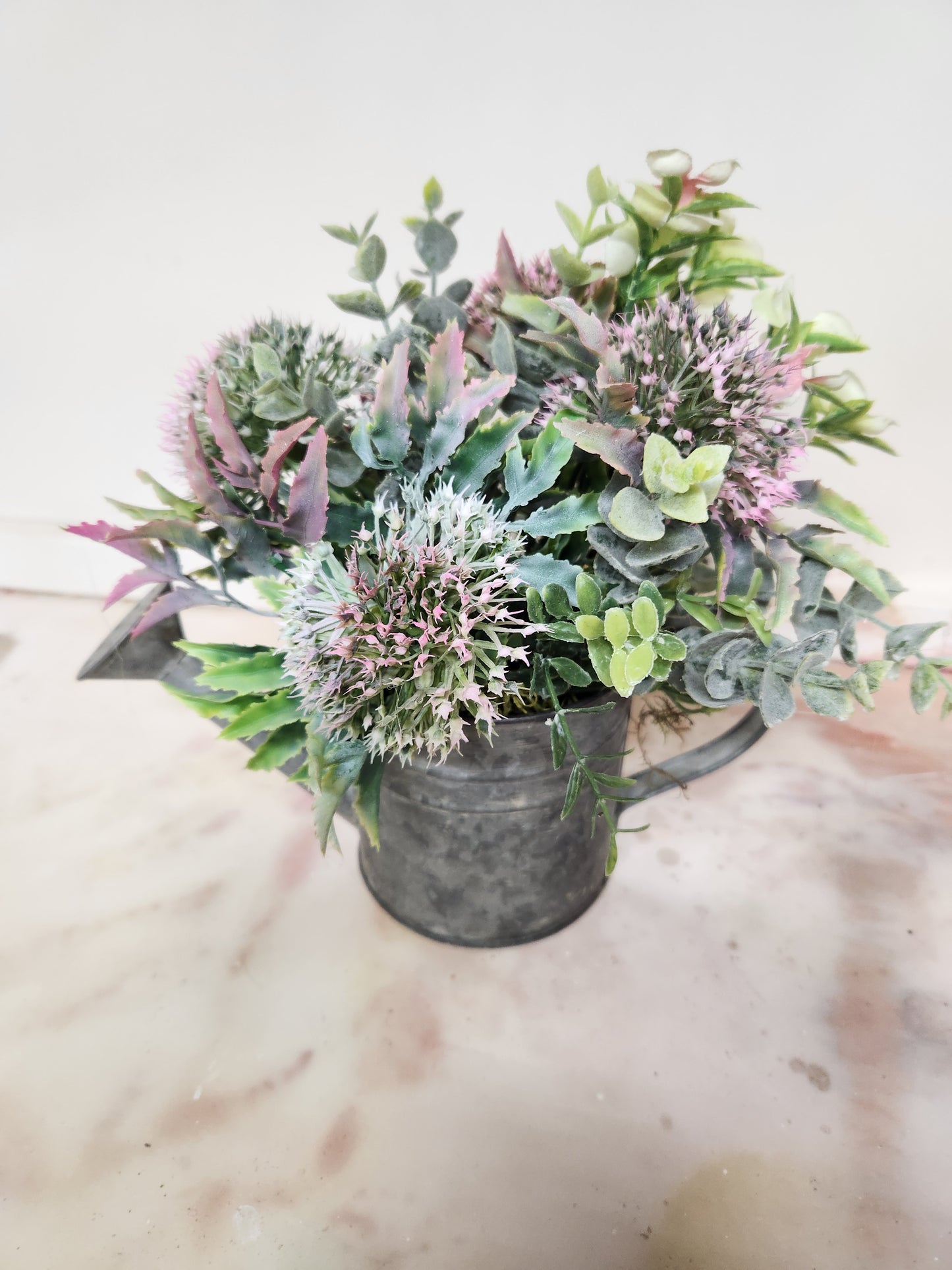 Watering can arrangement
