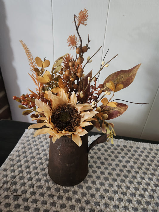 Arrangement in rustic pitcher