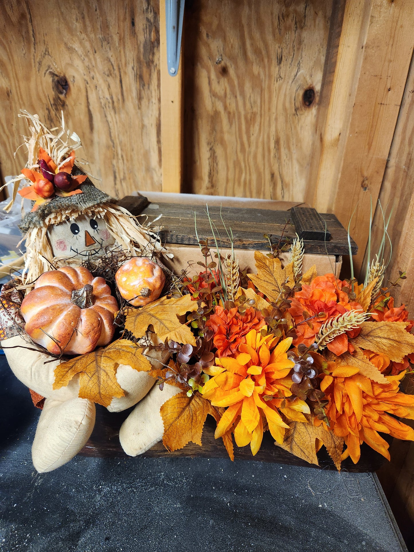 Scarecrow arrangement in old sewing machine drawer