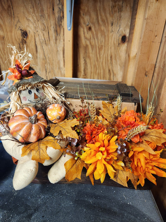 Scarecrow arrangement in old sewing machine drawer