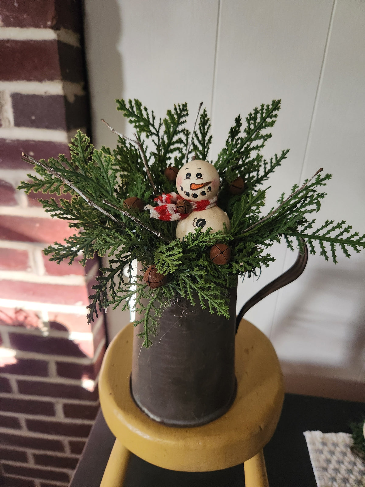 Snowman arrangement in vintage pitcher