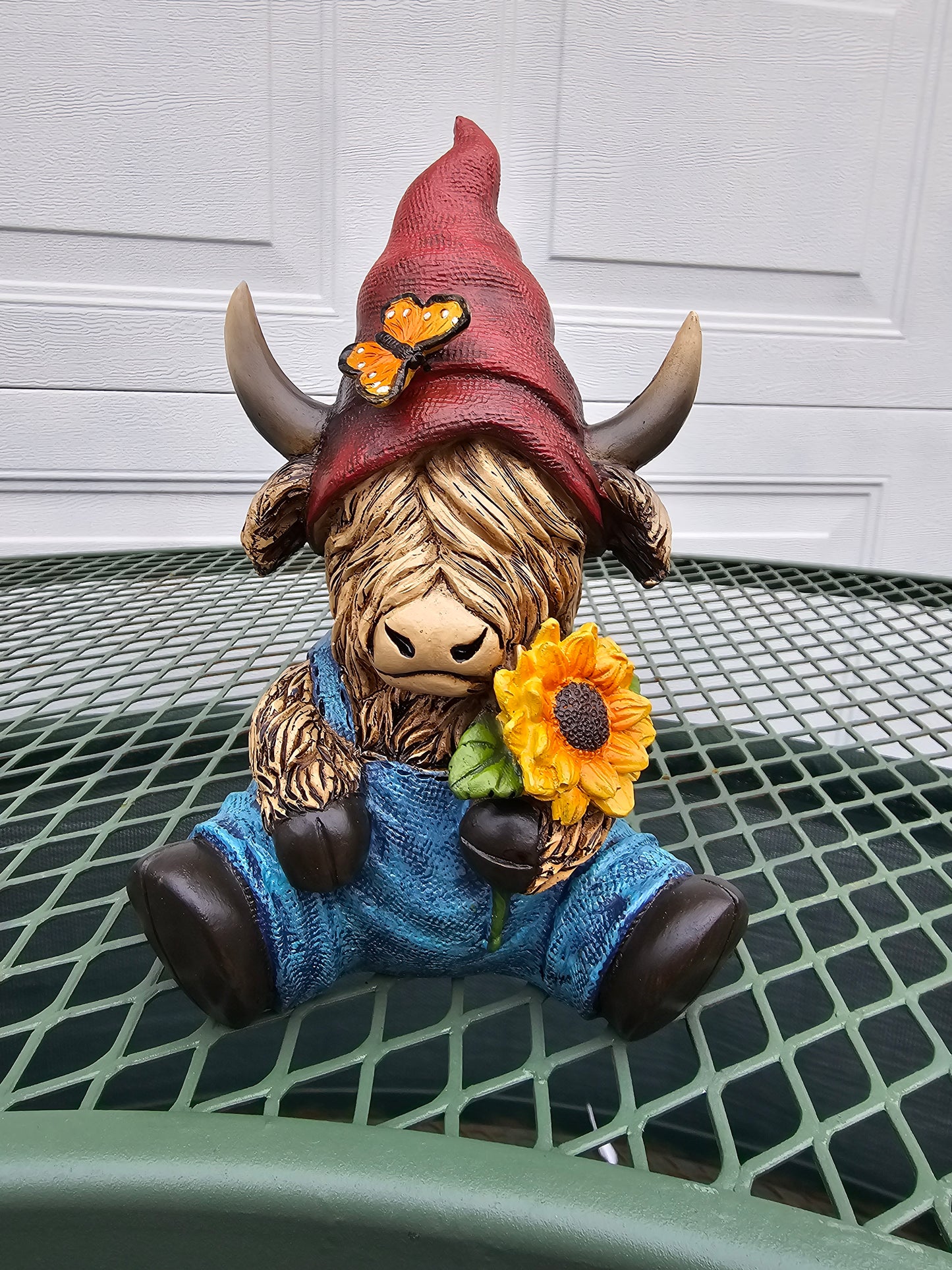 Highland cow gnome - red hat