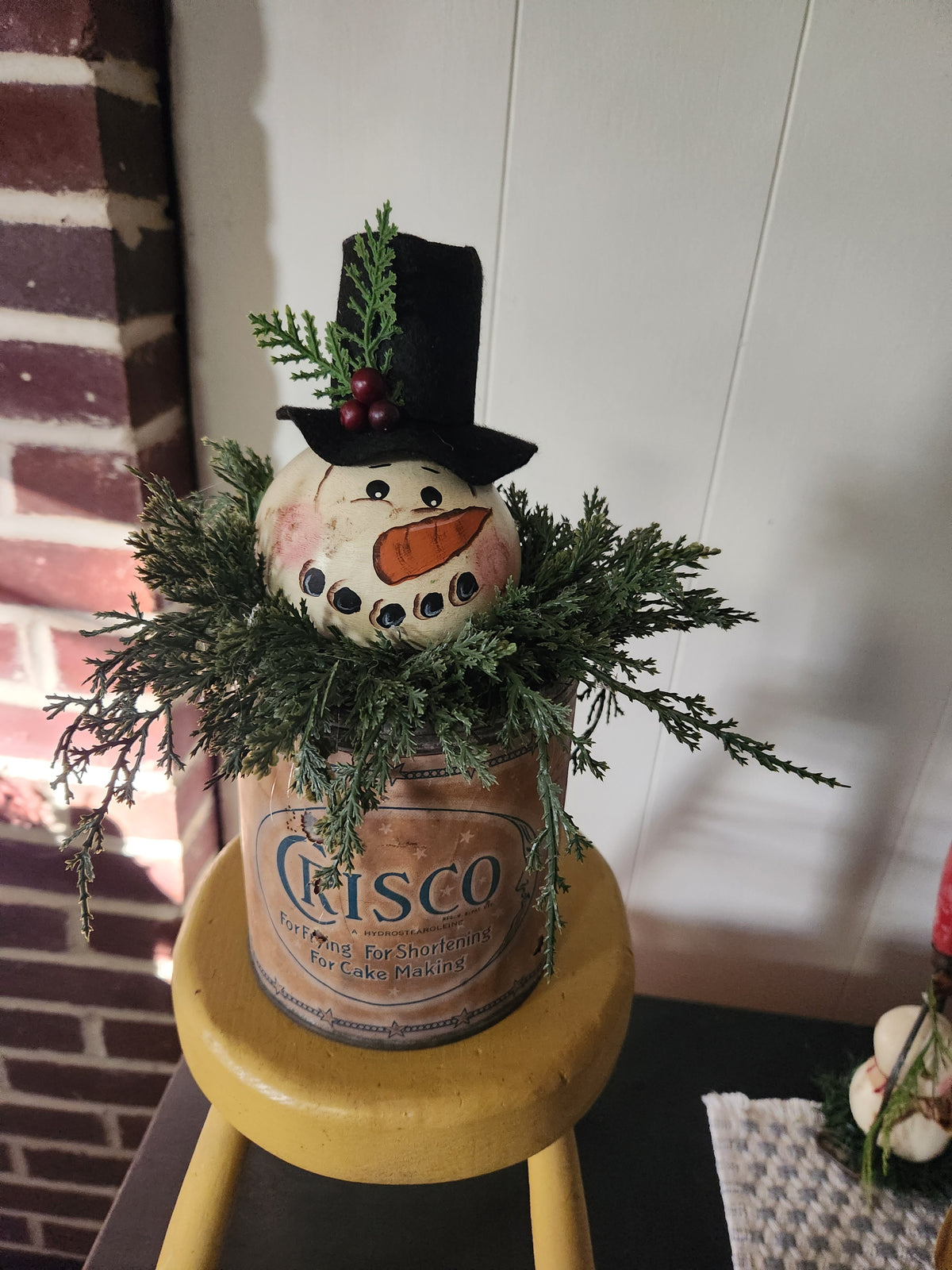Gourd snowman arrangement in old Crisco can