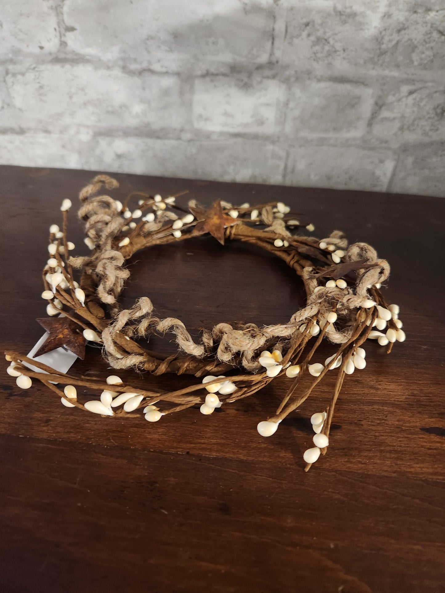 Candle ring with stars and twine