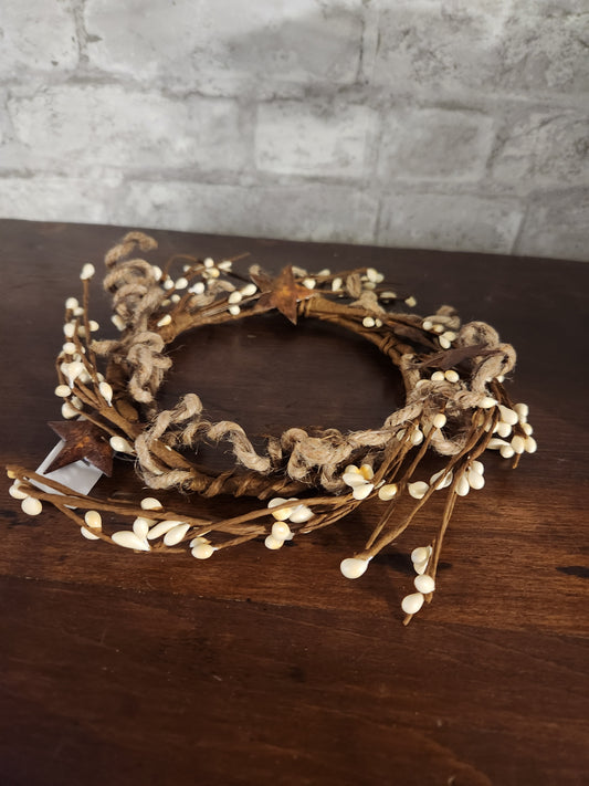 Candle ring with stars and twine