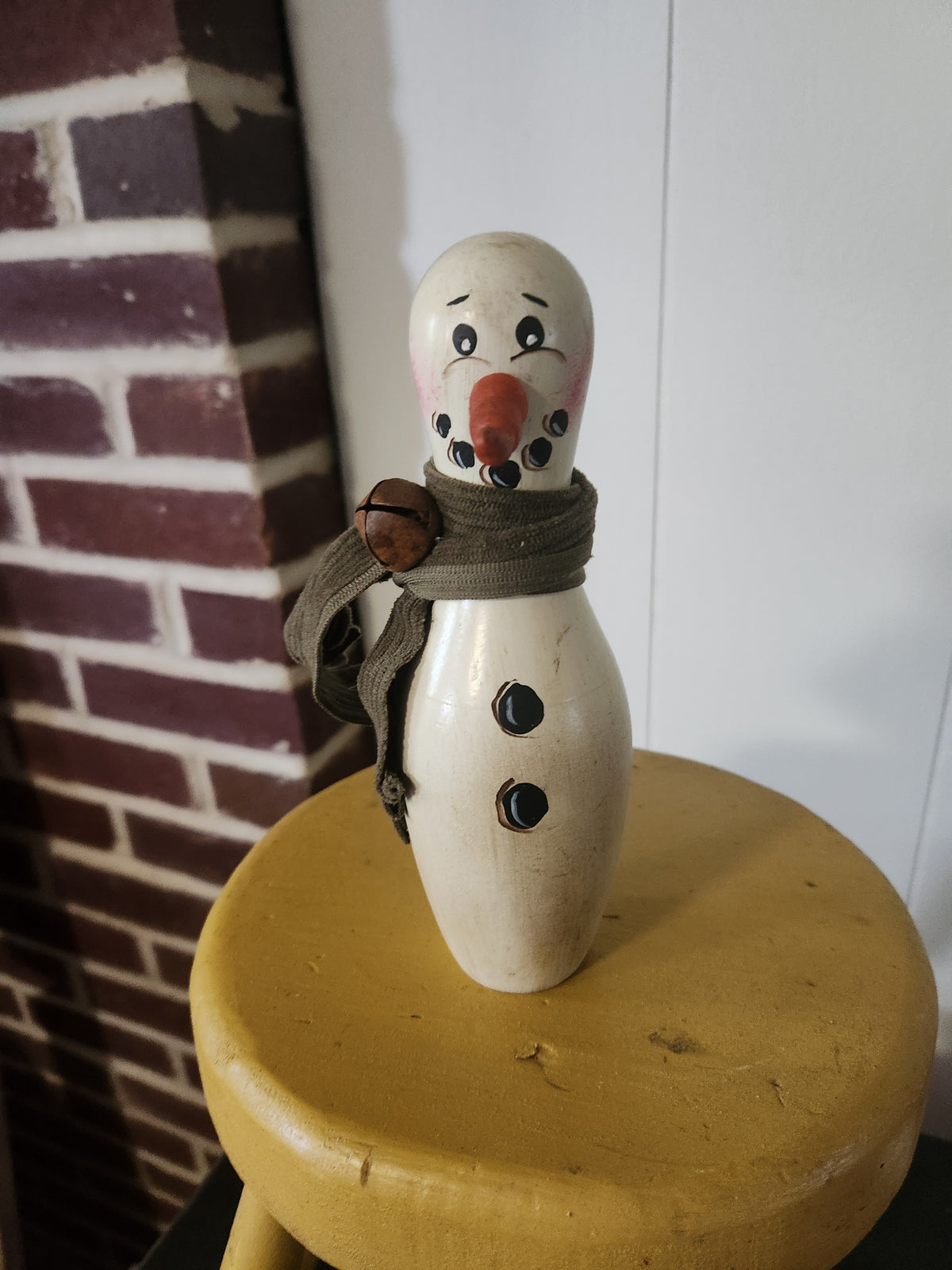 Snowman with green scarf